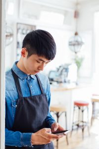 Foodservice Employee Using Phone 3