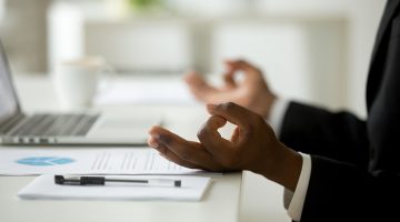 Meditation at desk.